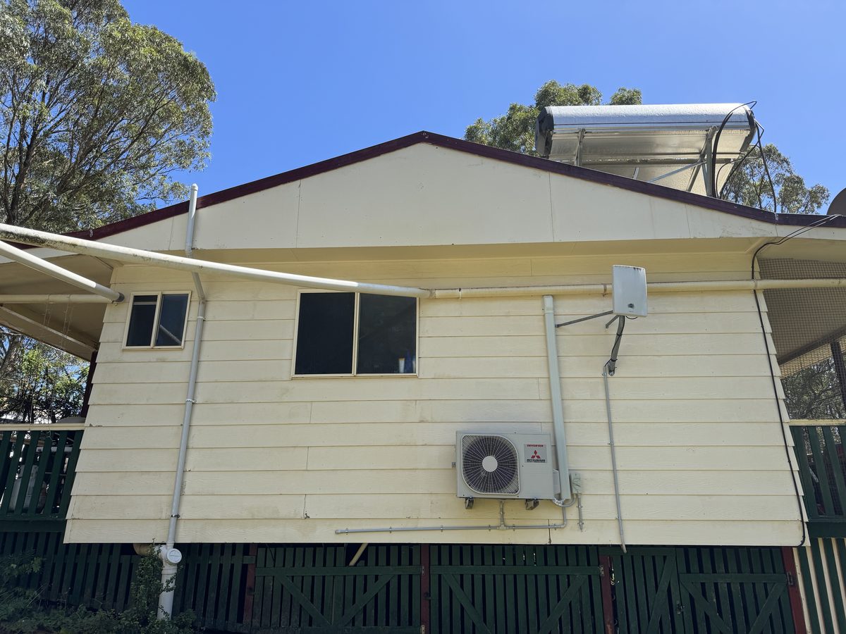 House exterior after soft wash cleaning — spotless, bright result